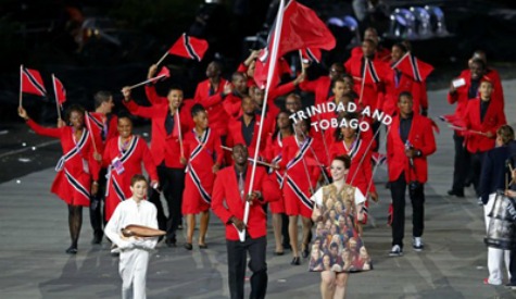 Flagbearer Marc Burns leads Team T&T during the opening ceremony of the 2012 Summer Olympics in London on Friday.